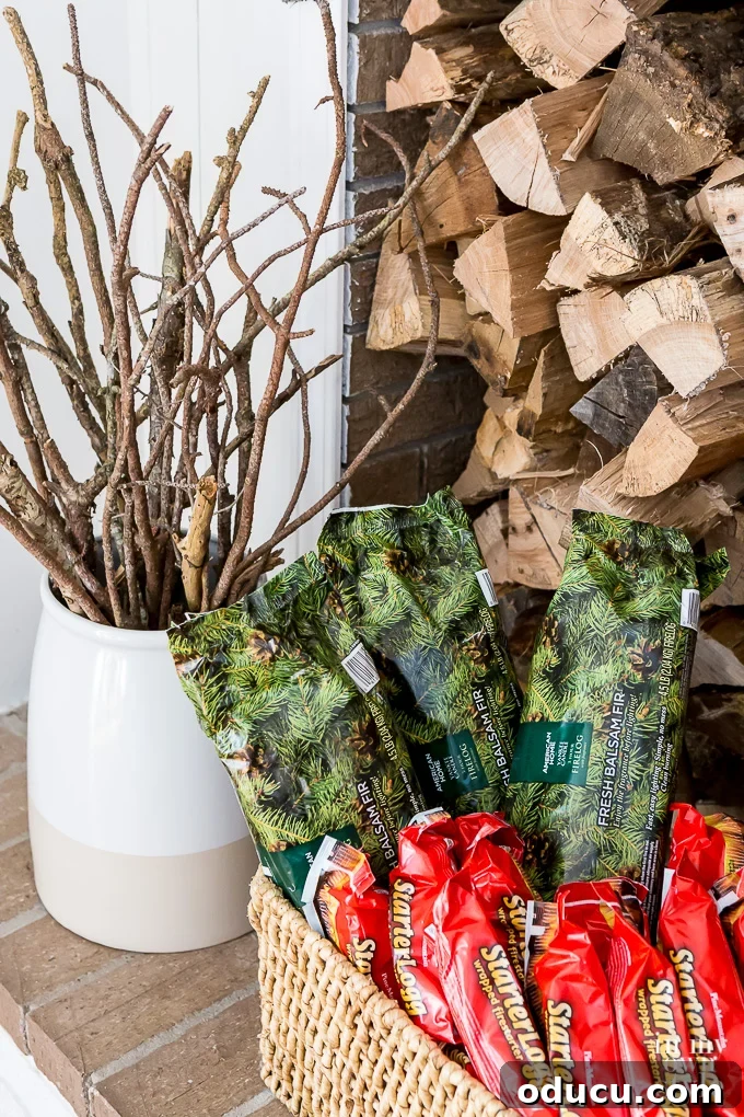 What is the best way to start a fire in a fireplace and keep it going? An organized firewood stacking and storage area, including Pine Mountain firelogs and traditional wood.