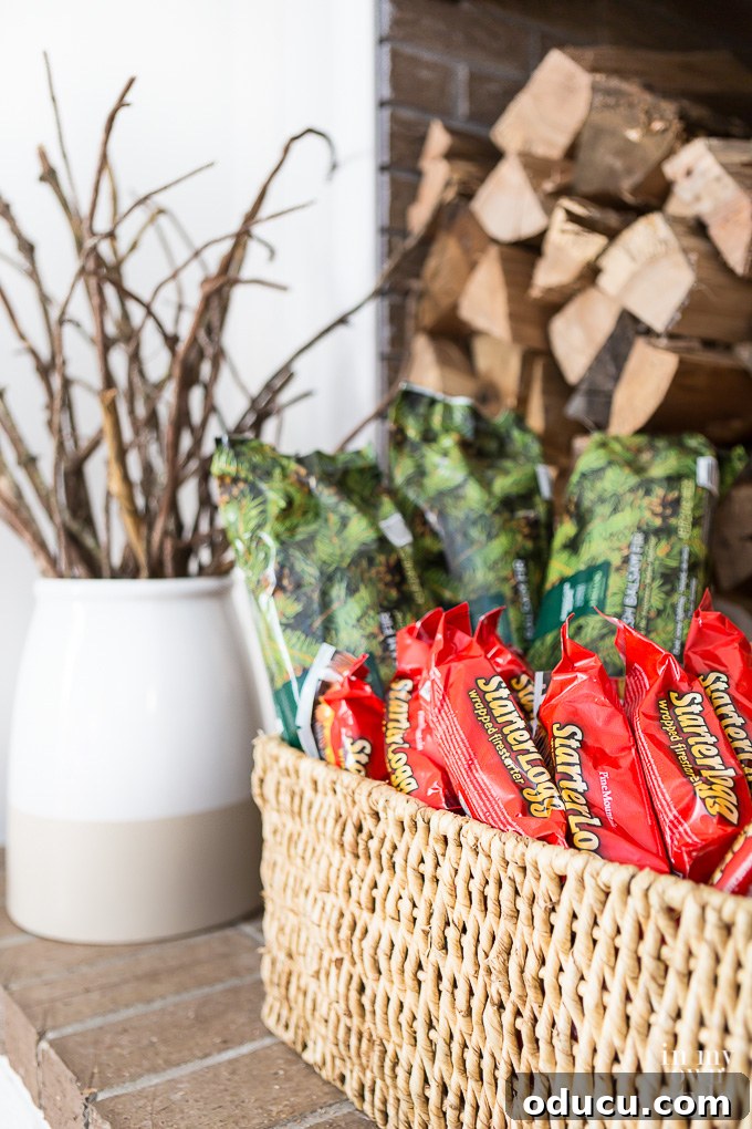 How to organize fire starting supplies around a fireplace. Organized fire starting supplies near a fireplace, including firelogs, kindling, and matches.