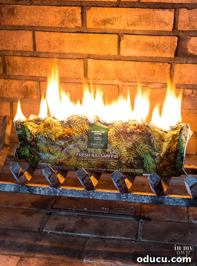 How long does a Pine Mountain firelog last? 3-4 hours. A lit Pine Mountain Fire Log burning brightly in a fireplace, showcasing a steady flame.