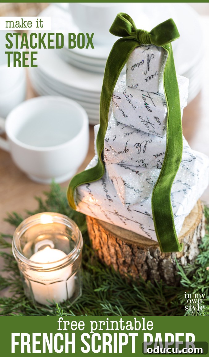 Christmas-Tree-Table-centerpiece-made-with-small-boxes-and-free-printable-of-French-Script-paper