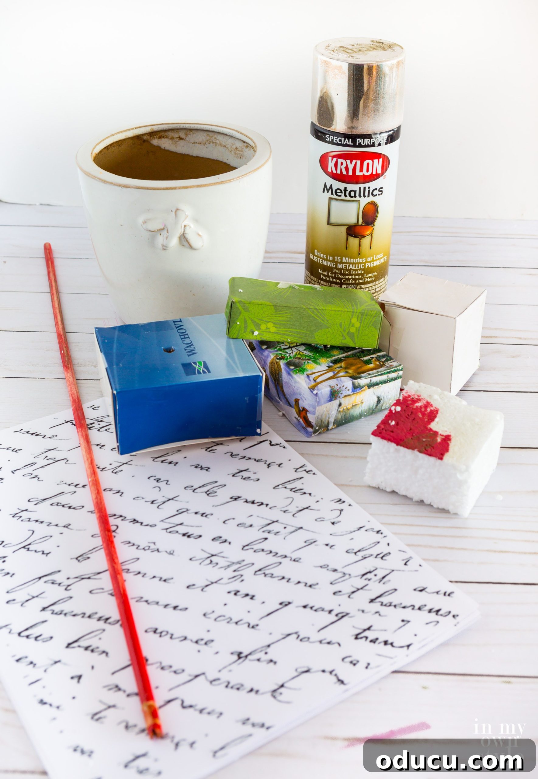 supplies needed to make a stacked box Christmas tree for a table or mantel