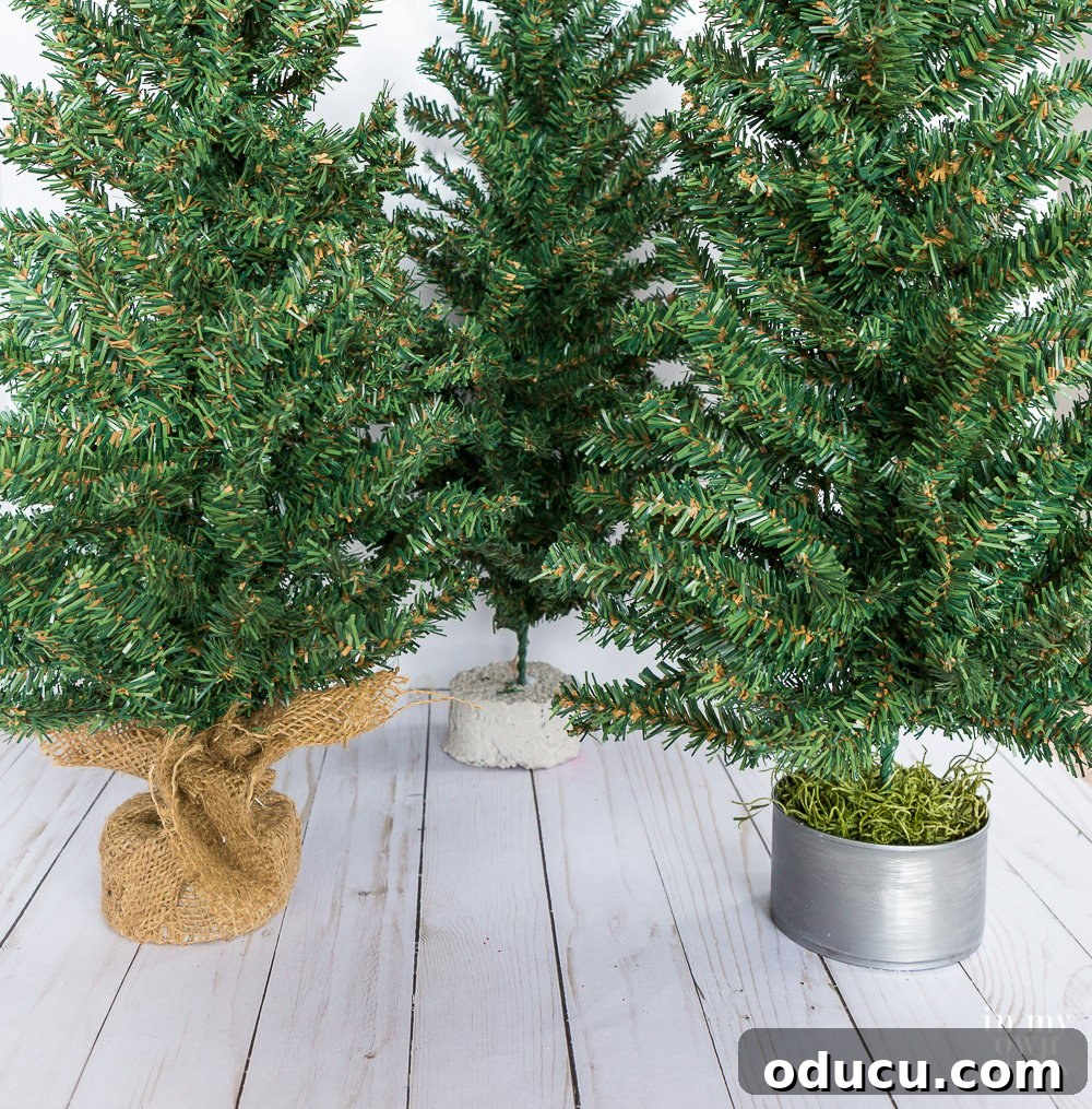 Tiny Tree, Big Style: Base Decor Hacks 4 Mini Christmas Tree Styling Idea: effortlessly remove the burlap base and replace it with a decorative tin can for a fresh, personalized look.