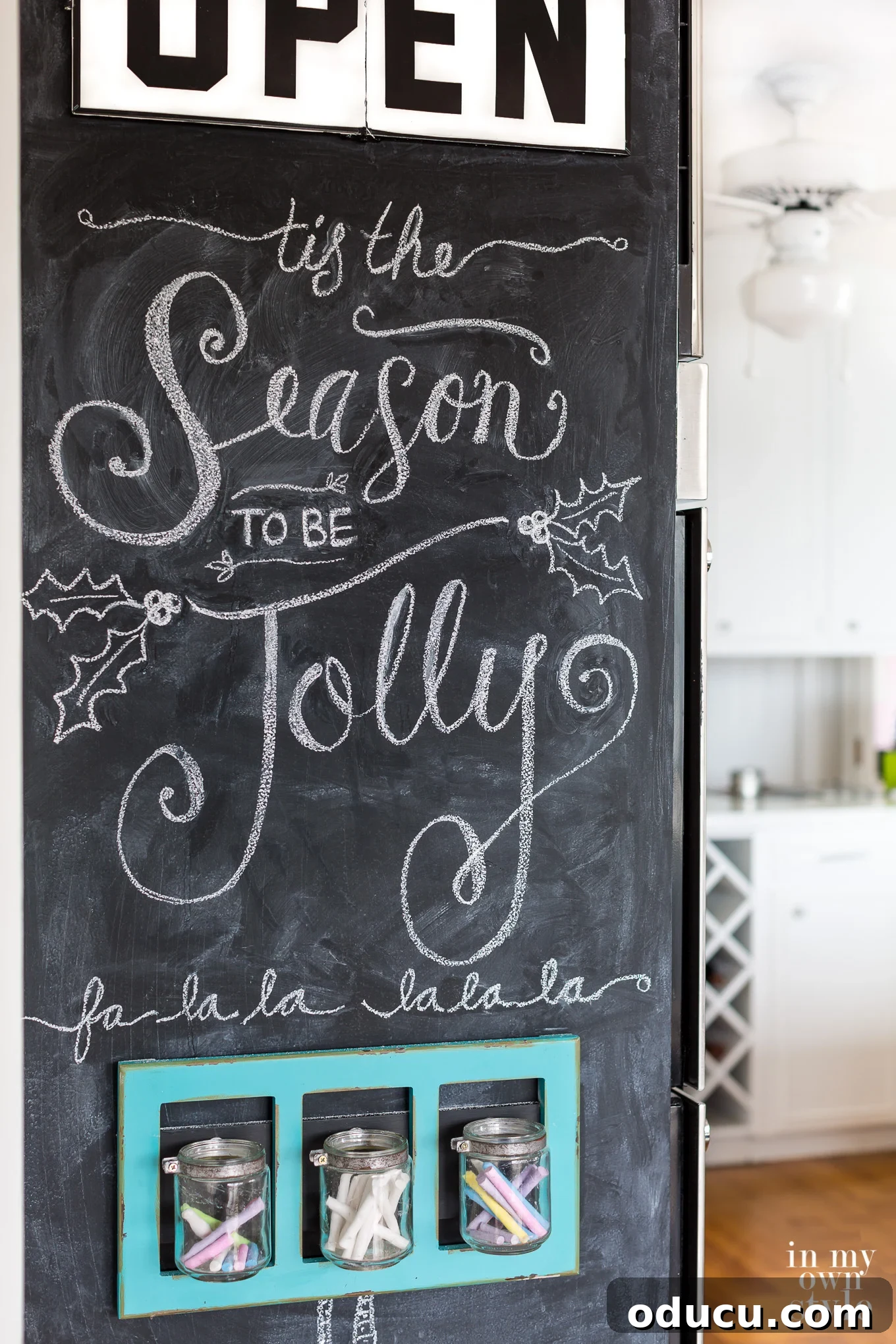 Detailed guide on how to paint a wall to create a functional floor-to-ceiling chalkboard surface.