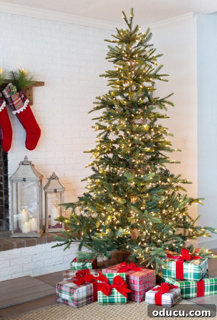 Beyond Baubles: Creative Tree Styling 9 Christmas tree with white twinkle lights only