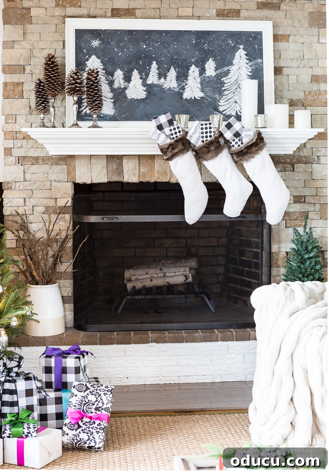 Christmas-Mantel-Decorating-Ideas using a chalkboard. Christmas-Mantel-Decorating-Ideas using a large chalkboard with drawn pine trees on it, showcasing handmade charm