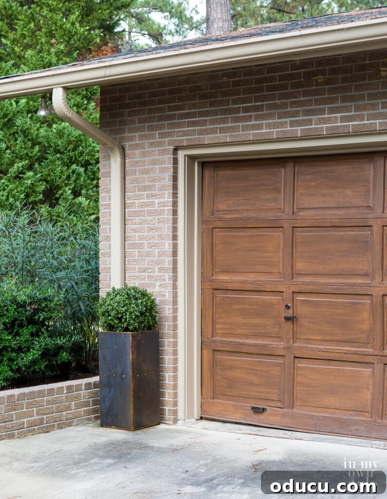 Paint Your Garage Door to Mimic Stained Wood: A DIY Transformation 13 Verdek Corten Steel Tall Planter before rusting process, complementing the home exterior