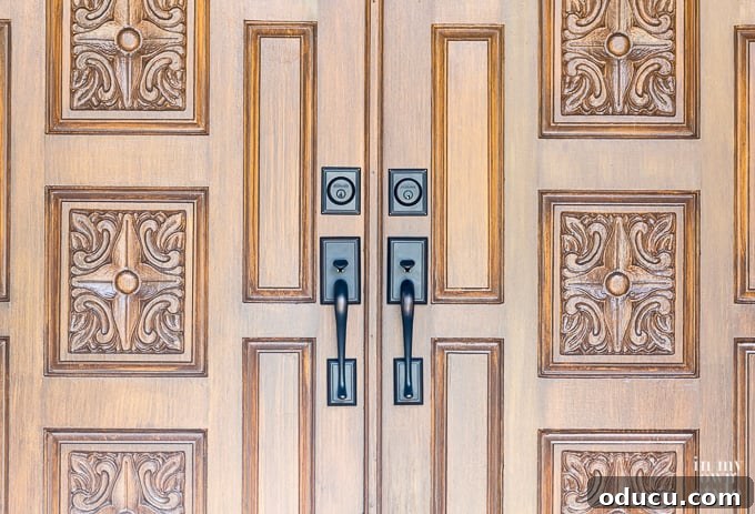 Paint Your Garage Door to Mimic Stained Wood: A DIY Transformation 4 Faux woodgrain painted front door before and after comparison