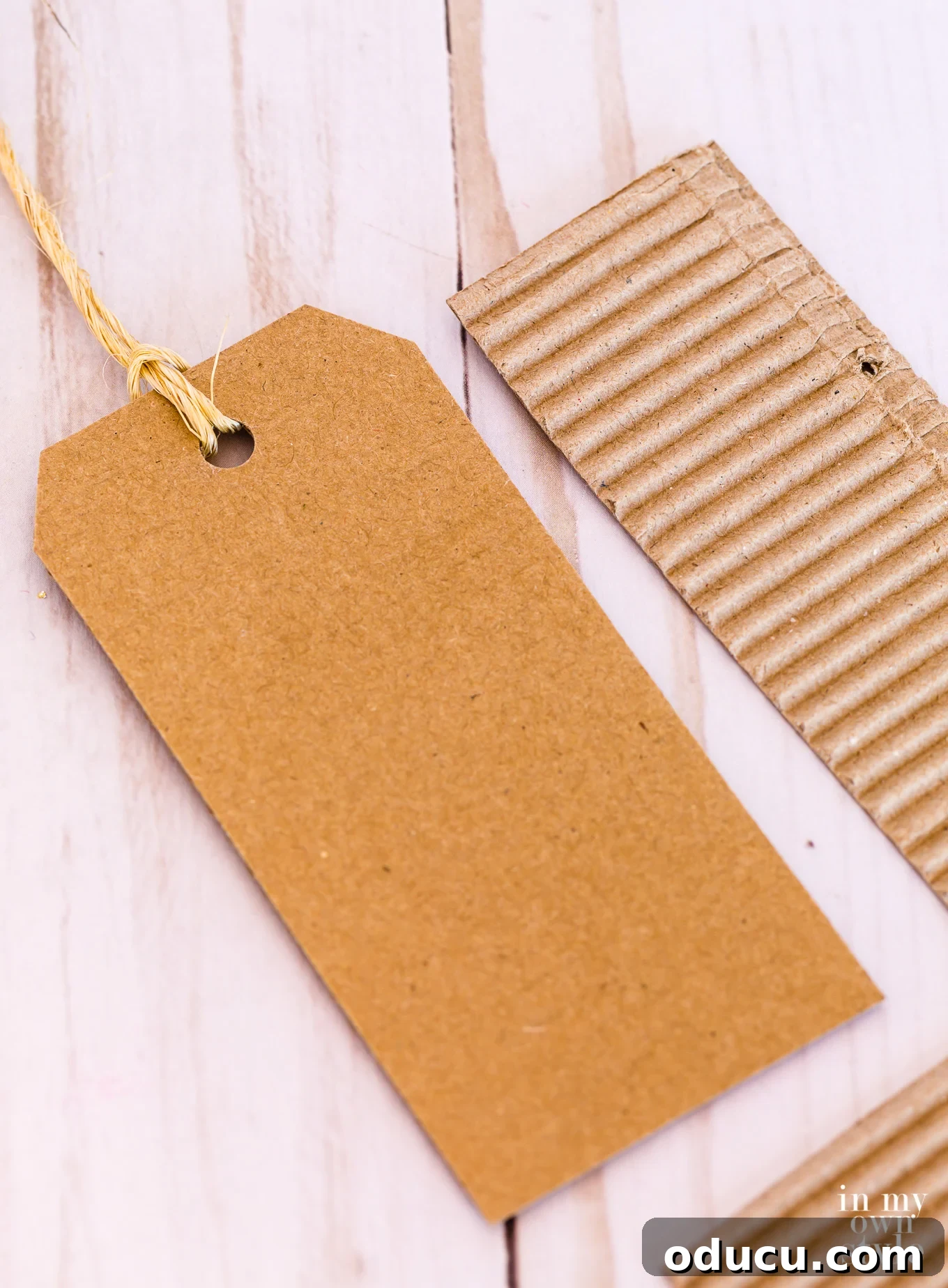 6 Brilliant Reasons to Skip Store-Bought Christmas Gift Tags 7 DIY Gift Tag Made from Recycled Cardboard Using a Free Template