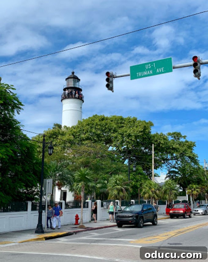 Keys Island Drive Adventure 15 Historic Key West Lighthouse against a blue sky