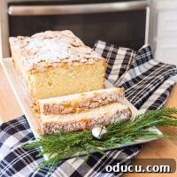 The Quintessential Old-Fashioned Lemon Pound Cake 4 Just baked Old Fashioned lemon pound cake on white plate