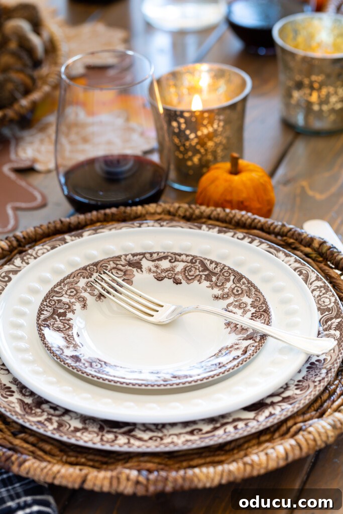 brown and white plates on a dining table