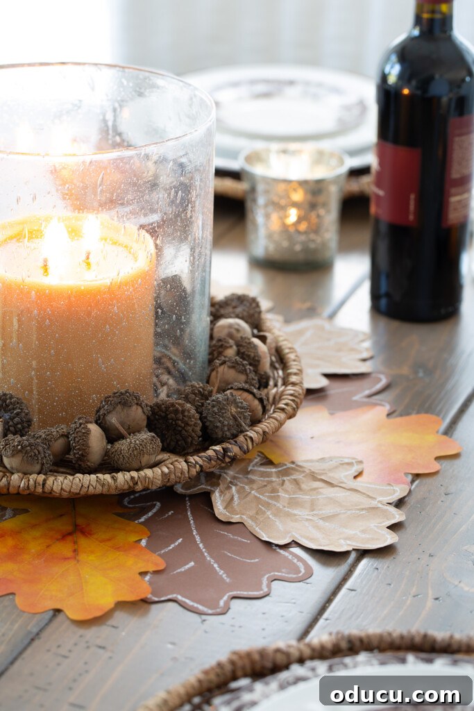 Cut out paper leaves made into a Thanksgiving table centerpiece.