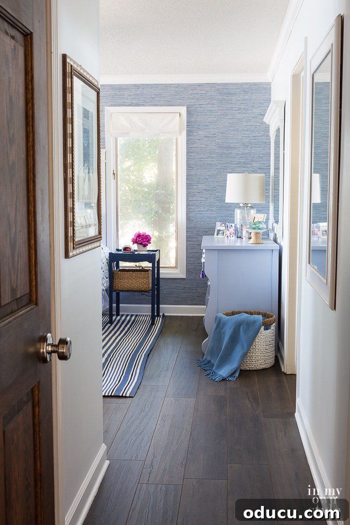 Curate your environment to reflect your unique personal style for enhanced well-being. A tastefully decorated bedroom with an accent wall, showcasing how personal style in decor contributes to living your best life.