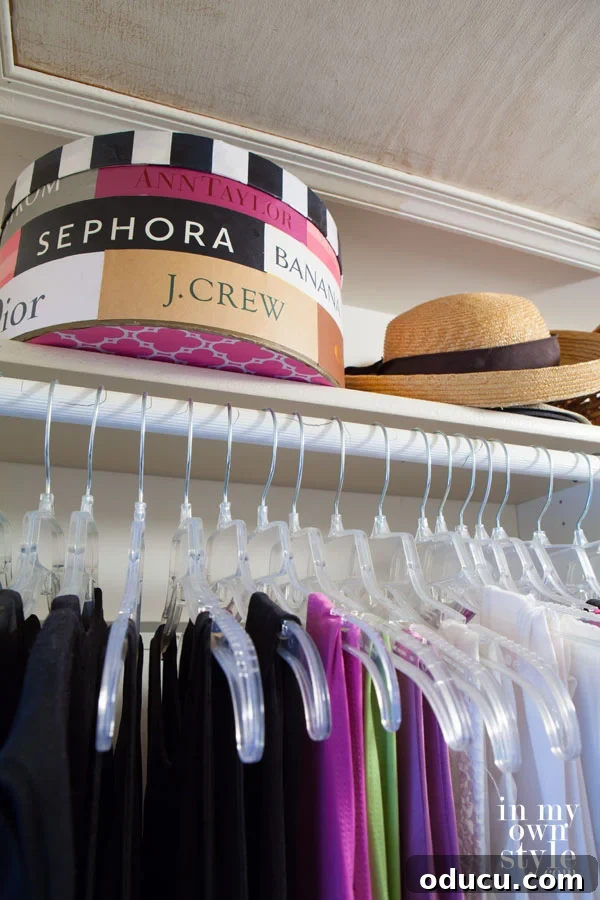Elevate your life with intentional shopping and organized spaces. Organized clothes closet with storage solutions, illustrating how mindful shopping contributes to a simplified life.