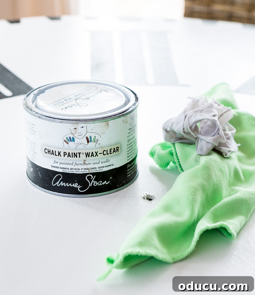 DIY Giant Farmhouse Wall Clock 15 Annie Sloan Clear Wax can be used to seal a painted plywood clock face, providing a durable and subtle protective finish.