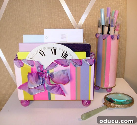 Desk-organizer-made-by-repurposing-packaging is one way to decorate a desk on a really small budget. Desk-organizer-made-by-repurposing-packaging sitting on desk top.