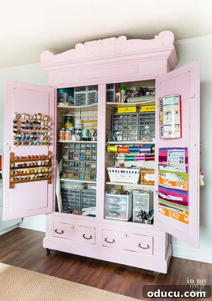 How to organize a craft supply storage cabinet when you are a DIY decorator working within a small budget. Pink craft storage cabinet for DIY home decorators