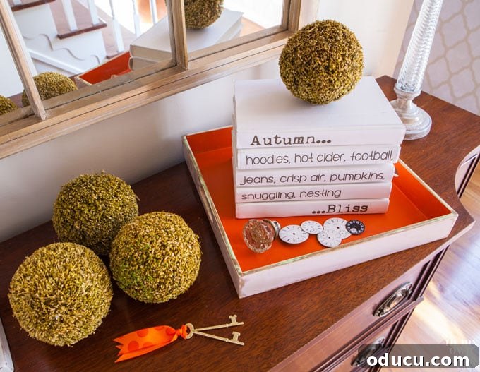How to make use of inexpensive thrift store book to help you decorate your home on a tight budget. Sideboard-Decorating-for-Fall on a small budget