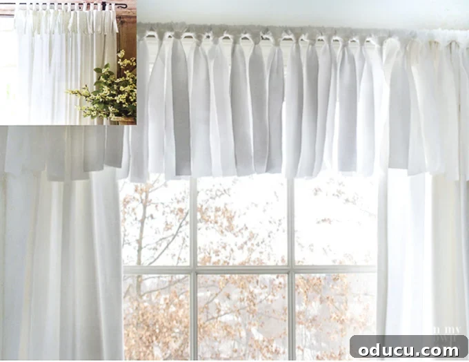 How to make a window valance when decorating on a small decorating budget. No Sew window white window valance made using a sheet.