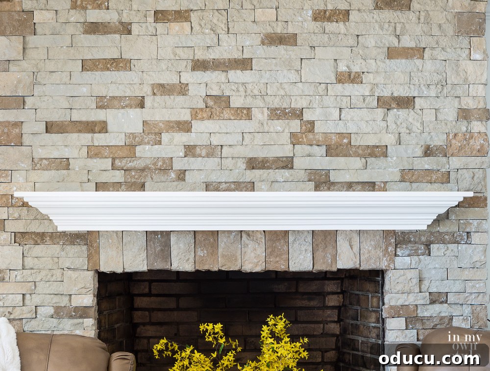 An empty mantel waiting to be decorated. An empty mantel, freshly cleared and ready for a new and inspired decoration project, inviting creative possibilities.