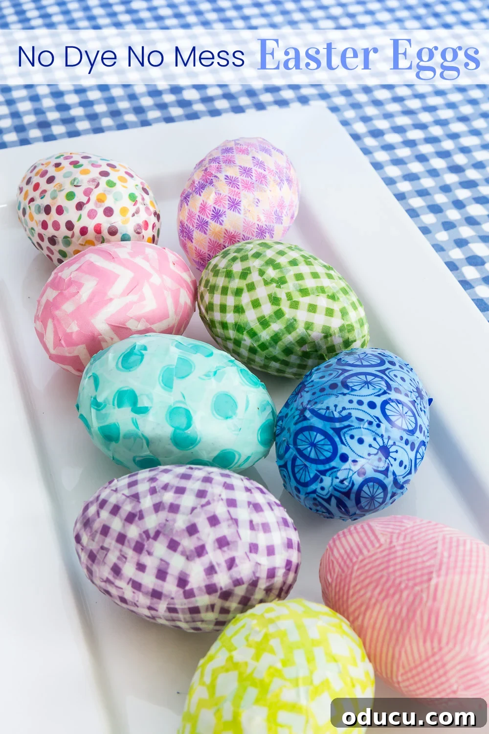 Beautiful Washi tape covered Easter eggs in a white tray, showcasing no-dye, no-mess coloring.