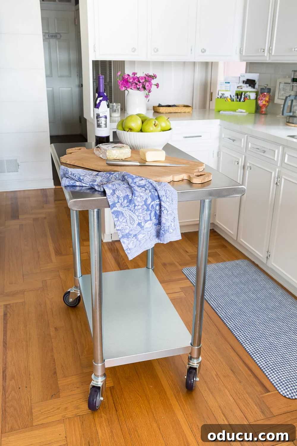 My Small Kitchen's Island Upgrade 6 A stylish center kitchen island on wheels, providing essential extra counter space.
