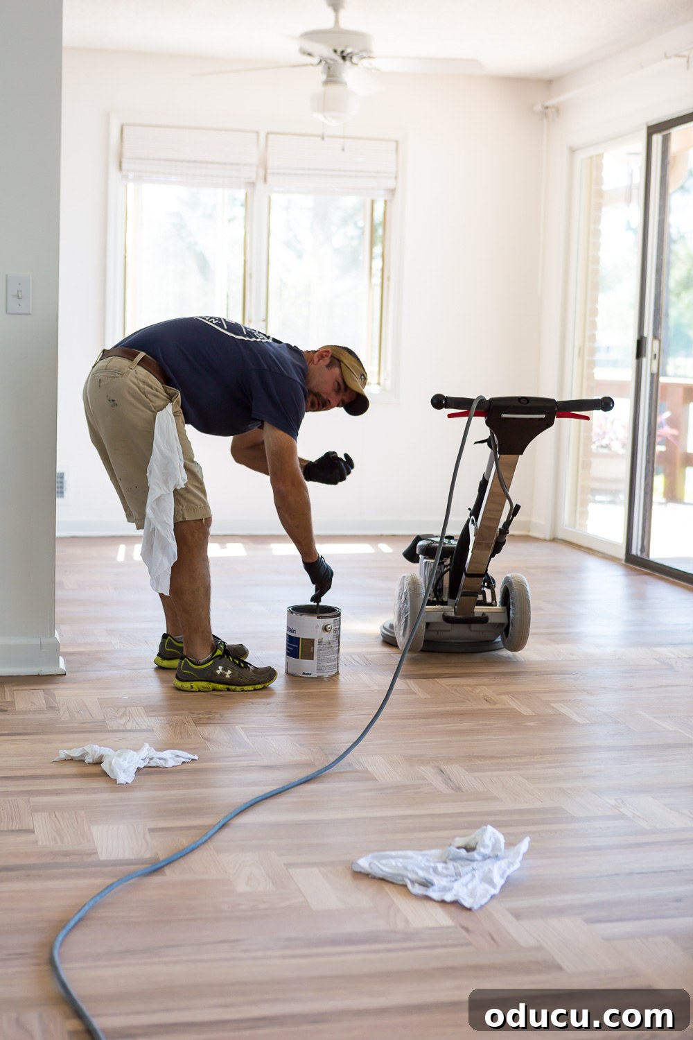 Bona floor refinishing professional expertly staining hardwood floor