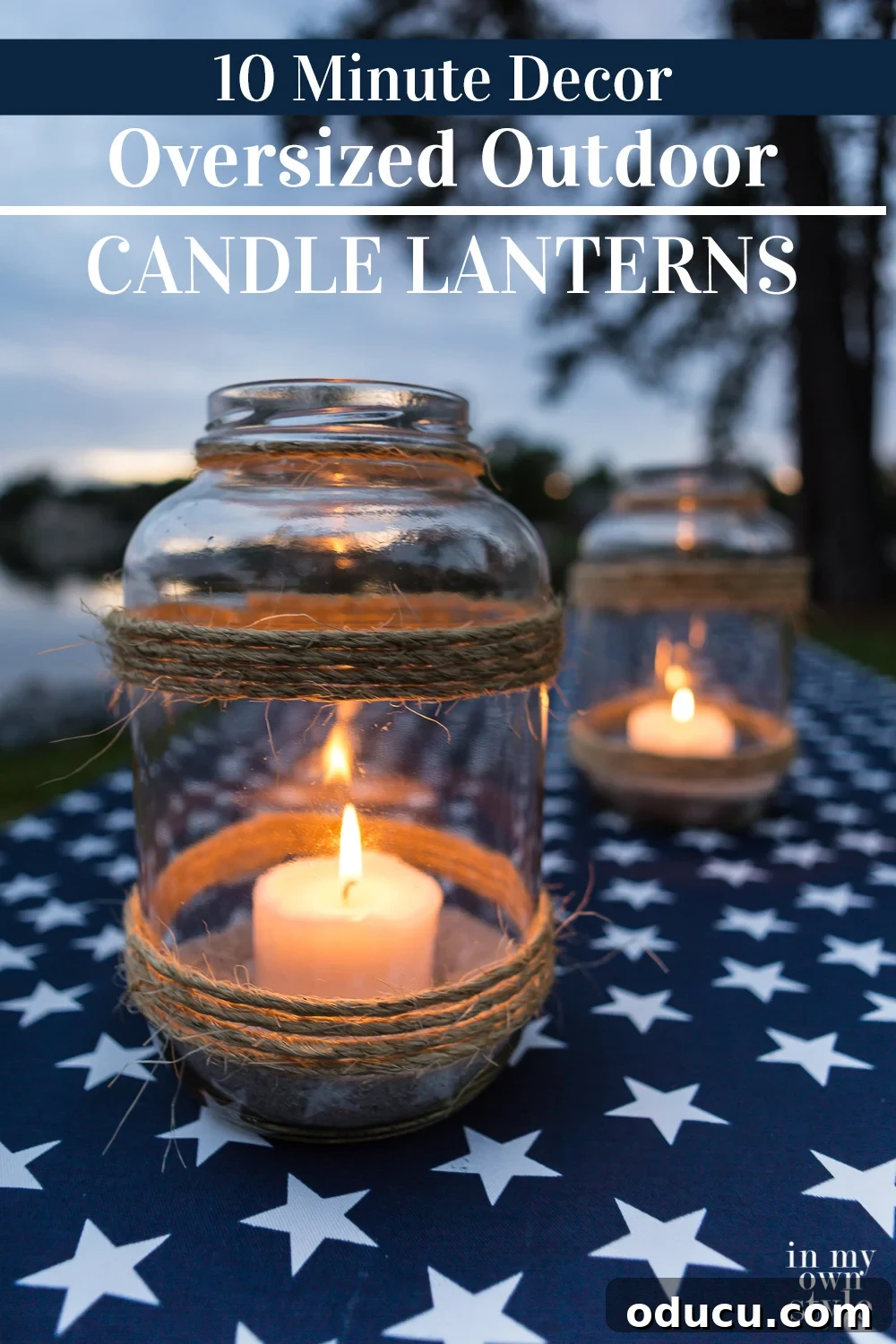 Craft a Stunning Oversized Glass Candle Lantern 2 Image of a picnic table with a patriotic tablecloth and a DIY oversized glass candle lantern, perfect for outdoor entertaining.