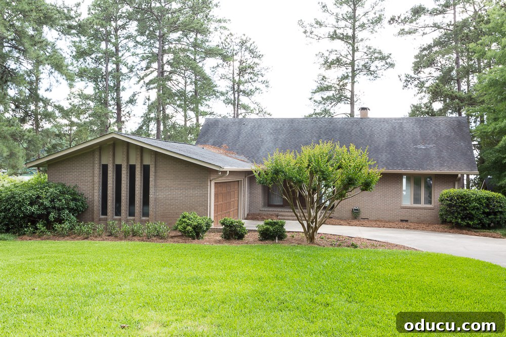 From Faded to Flawless: Exterior Home Painting 4 tan brick Ranch house after new paint