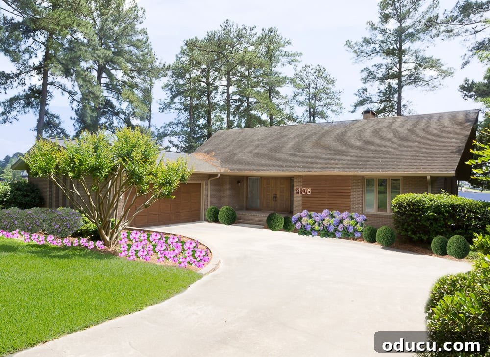 From Faded to Flawless: Exterior Home Painting 5 Outside of a home that was just painted tan from a dark teal color