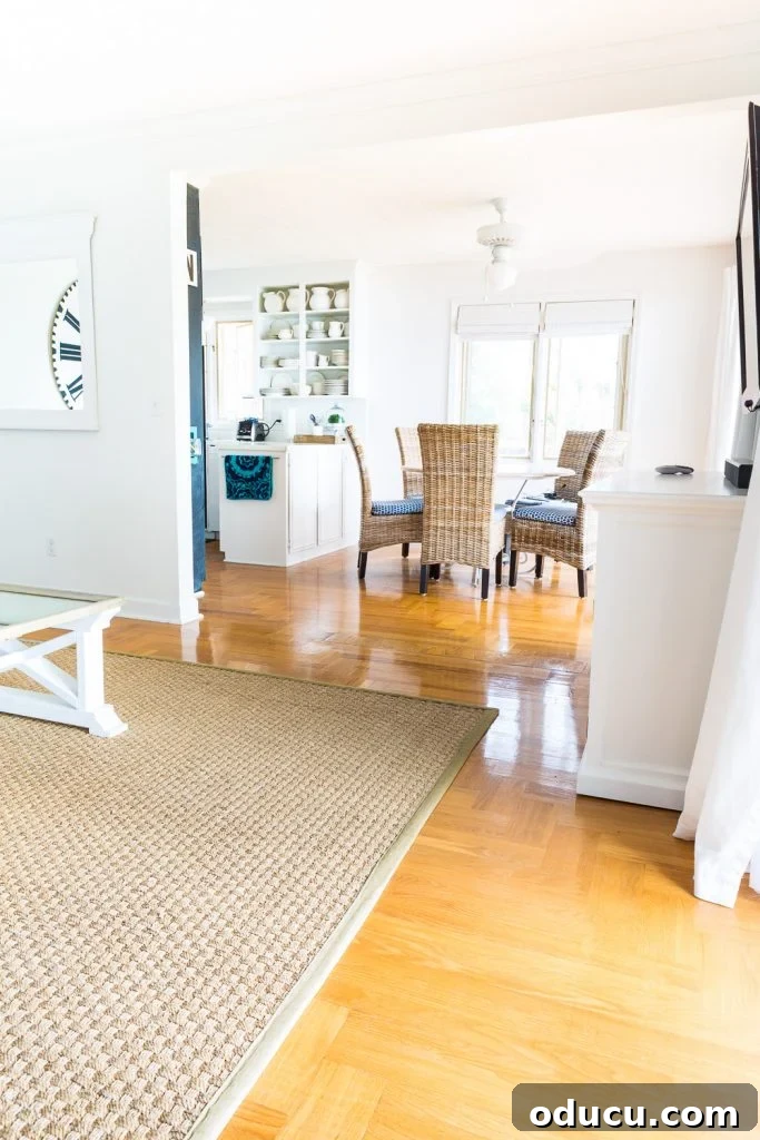 Hardwood Floor Revival: A New Beginning 3 Living room showing hardwood floor that has turned orange over time