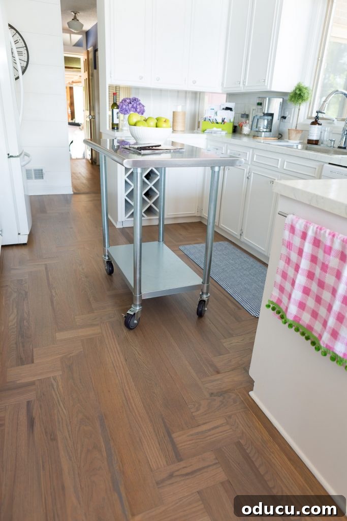 Hardwood Floor Revival: A New Beginning 7 The stain color on this Kitchen floor is Bona Drifast stain in Grey.