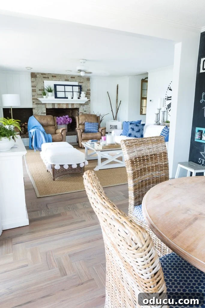 Customizing Your Seagrass Rug with Paint 2 Open concept floor plan in home with coastal blue and white decorating.