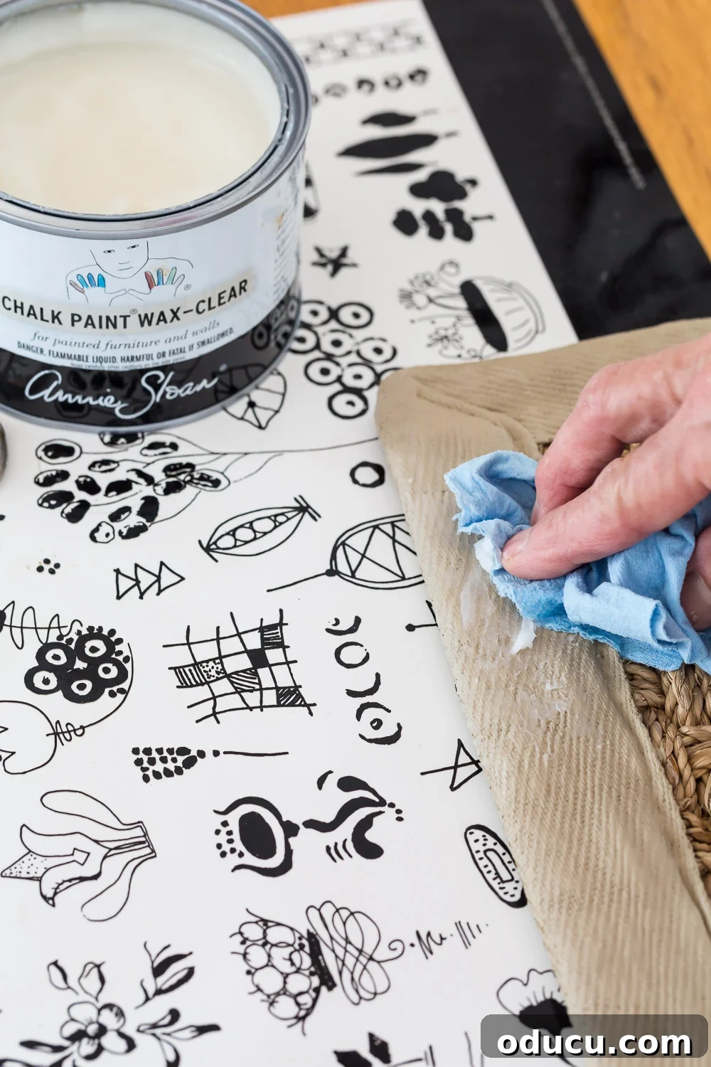 How to seal the newly painted border fabric on a seagrass rug with paste wax.