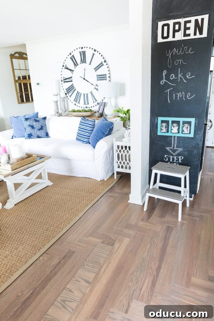 Customizing Your Seagrass Rug with Paint 8 Open concept floor plan decorating tips. Shown in the photo is how and area rug separates two rooms.