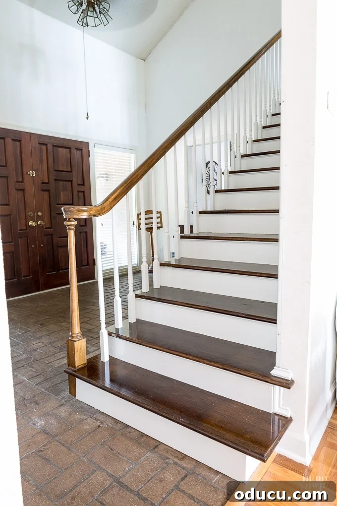Still Relevant 7 Lake House foyer staircase makeover, stained and painted