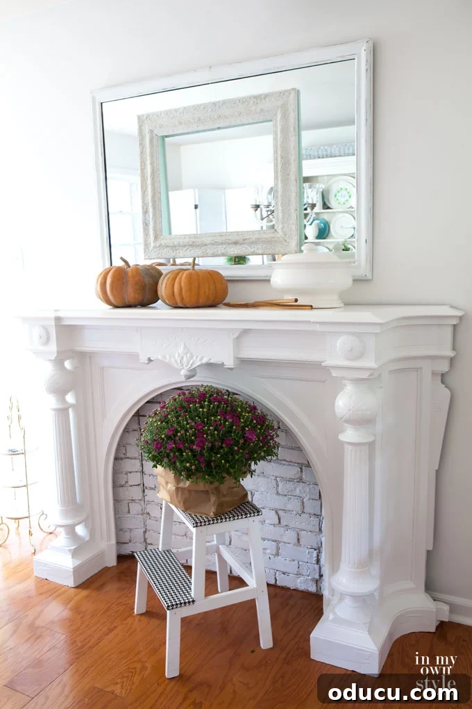Echoes in Every Element 13 Fall decorating ideas for dining rooms, featuring a mantel with no fireplace that holds a touching family story.