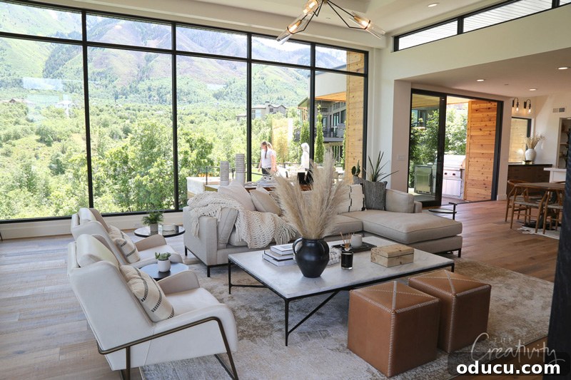 Ottomans: From Footrest to Focal Point 5 An example of a modern living room furniture arrangement layout, distinctly showcasing the practical and stylish use of identical ottomans.