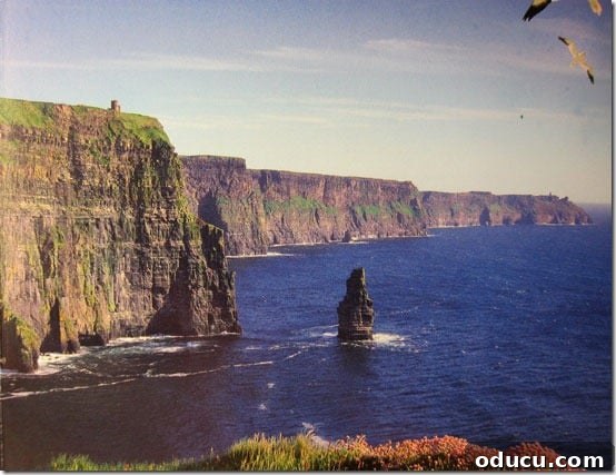 Ireland-Cliffs-of-Mohr-on-a The awe-inspiring Cliffs of Moher basking in glorious sunshine