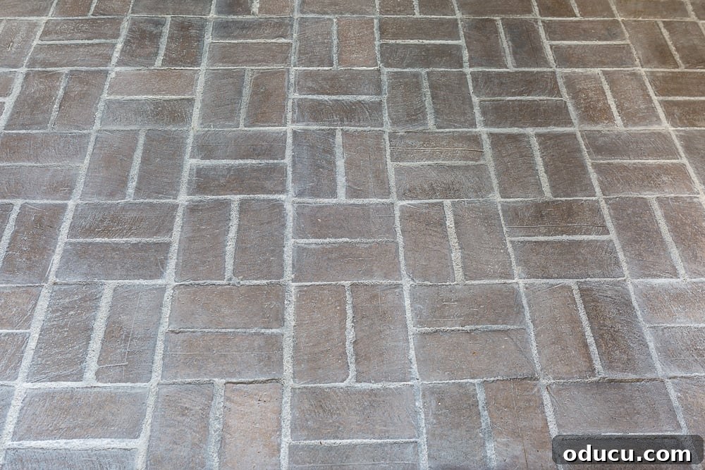 My $14 Whitewashed Brick Floor Makeover 12 A section of floor showing the completed whitewashing over the brick and grout floor.