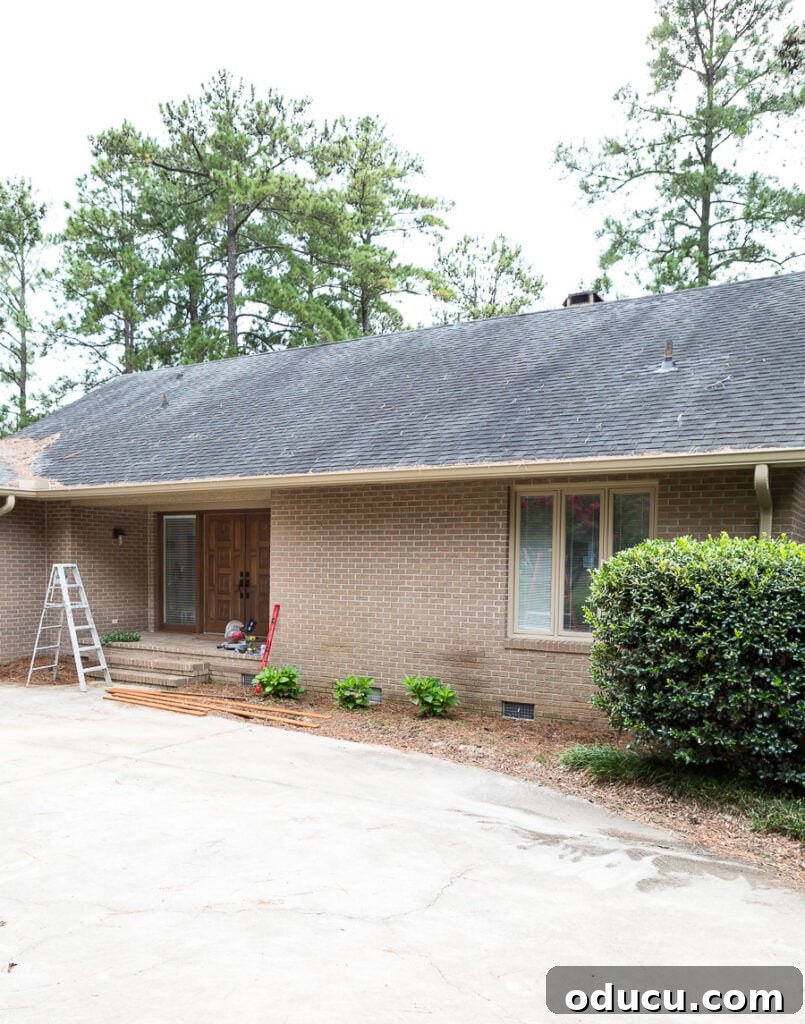 Brick Ranch house Before adding an outdoor wood accent feature, highlighting the plain facade.