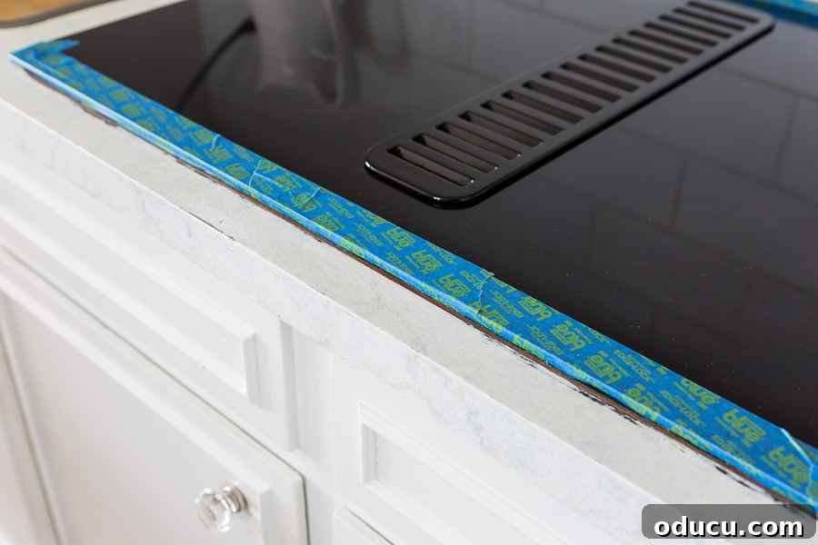 Flawless Finish: Repairing Painted Kitchen Counter Scratches and Dings 11 Picture of painted kitchen counter getting repaired, showing optional masking.