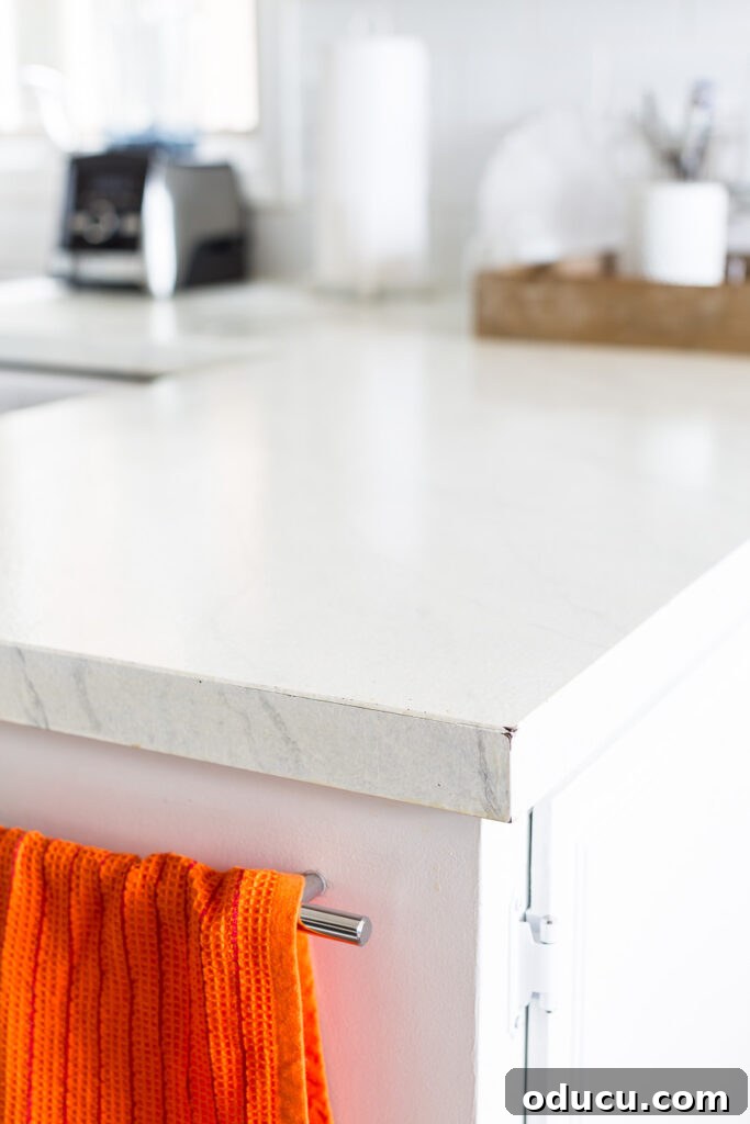 Flawless Finish: Repairing Painted Kitchen Counter Scratches and Dings 17 Close-up picture of a painted kitchen countertop, highlighting its durability.
