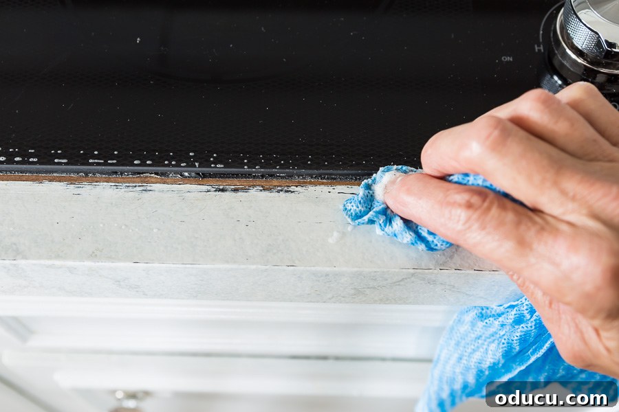 Flawless Finish: Repairing Painted Kitchen Counter Scratches and Dings 10 Steps to fix dings in a painted kitchen counter, including cleaning.