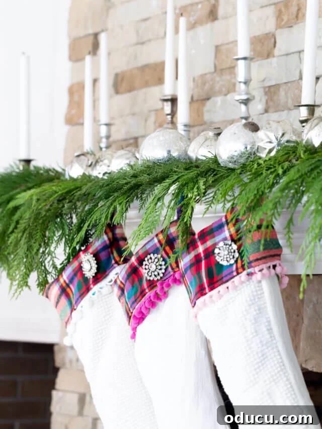 cropped Christmas Plaid Candlelit Mantel Decorating Idea, exuding festive charm and warmth