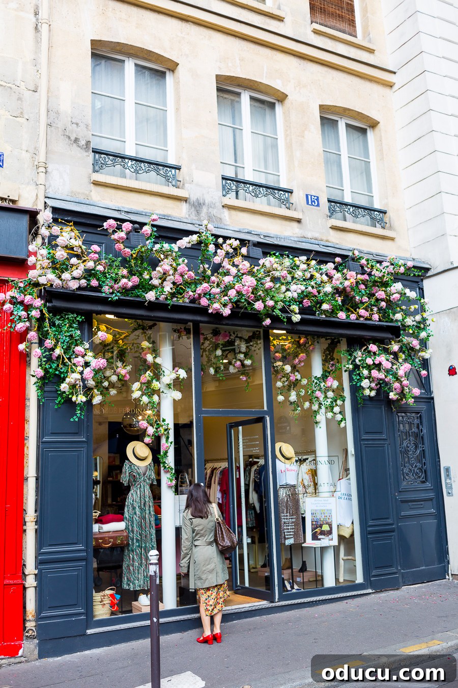 Discovering Paris on Foot 25 Pretty shop on St Germain Paris with flowers over the top of the entrance
