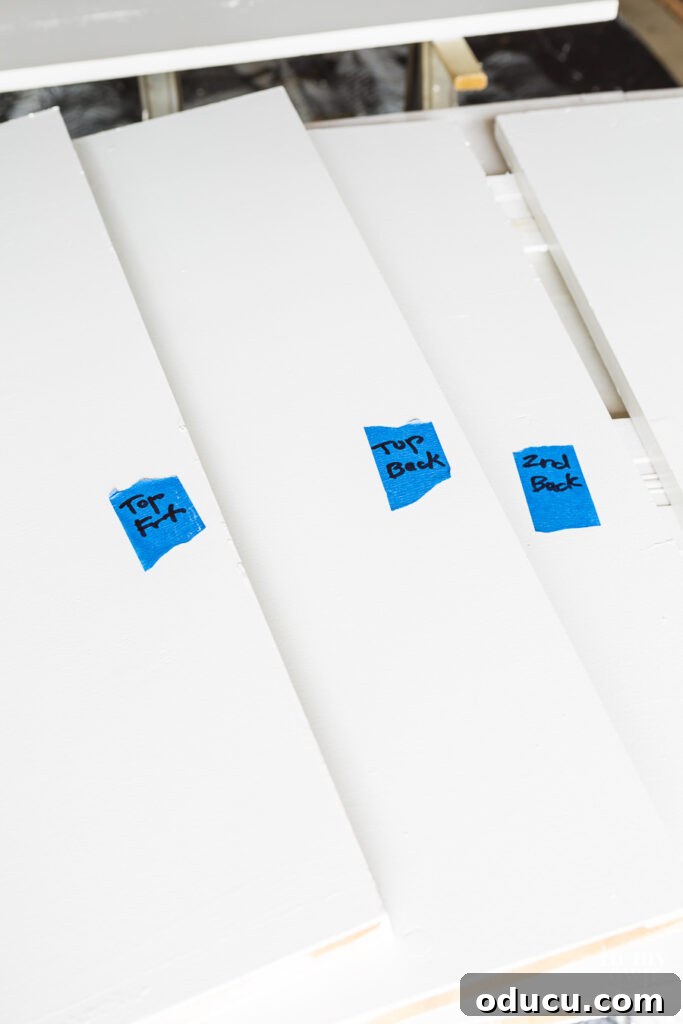 Why Primer Is Essential For Painting Over Stained Paint 10 Blue painter's tape made into labels to number shelves when removing them from a closet before painting.
