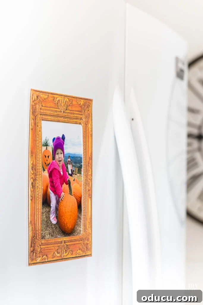 Step-by-step guide on how to create a free printable classic photo frame for your refrigerator, ideal for displaying kids' art and photos cleanly.