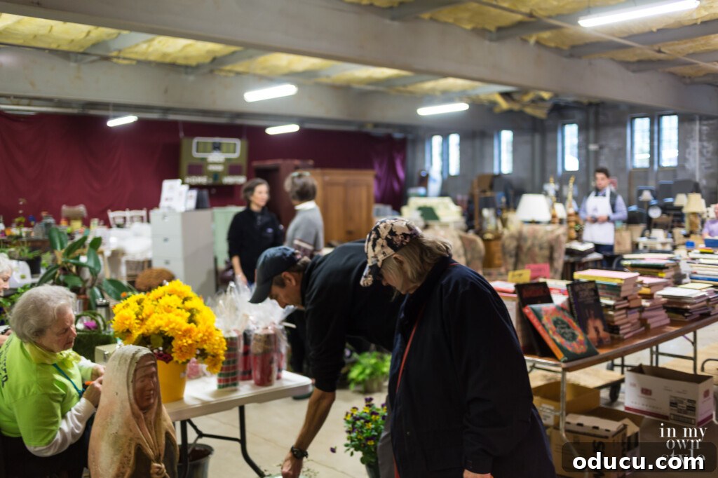 Decorating Magic for Just $23 6 A room filled with books and furniture at a bustling holiday church bazaar, inviting treasure hunters.