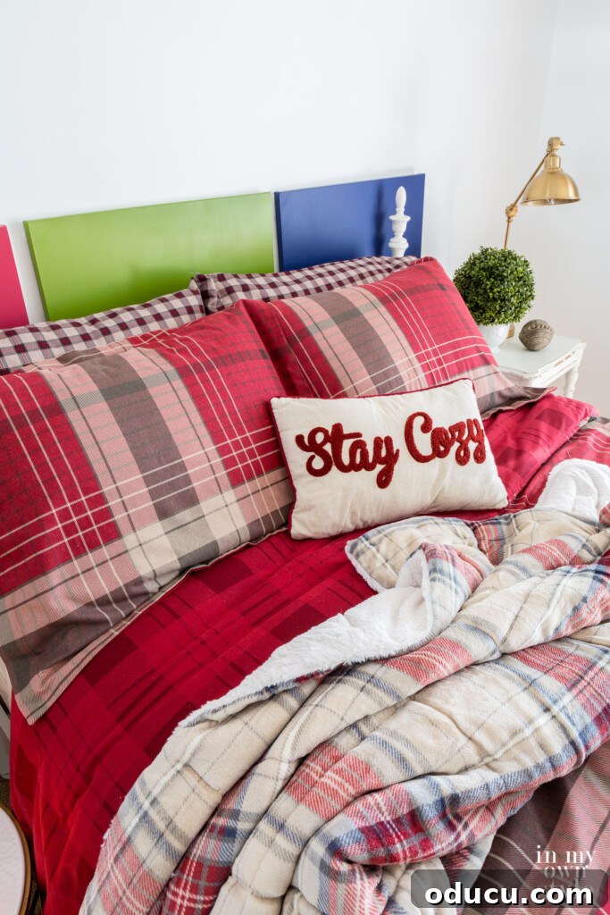 Spare Room to Serene Sanctuary 6 .CuddlDuds Red Plaid bedding from Kohls on bed in a guest room, showcasing winter bedroom decor.